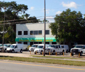 Charles Wayne Represents Subsidiary of  DRA Advisors in Sale of New Smyrna Auto Property